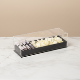 Flowers and cash gift in an acrylic box