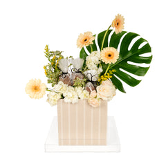 Flower arrangement with chocolate