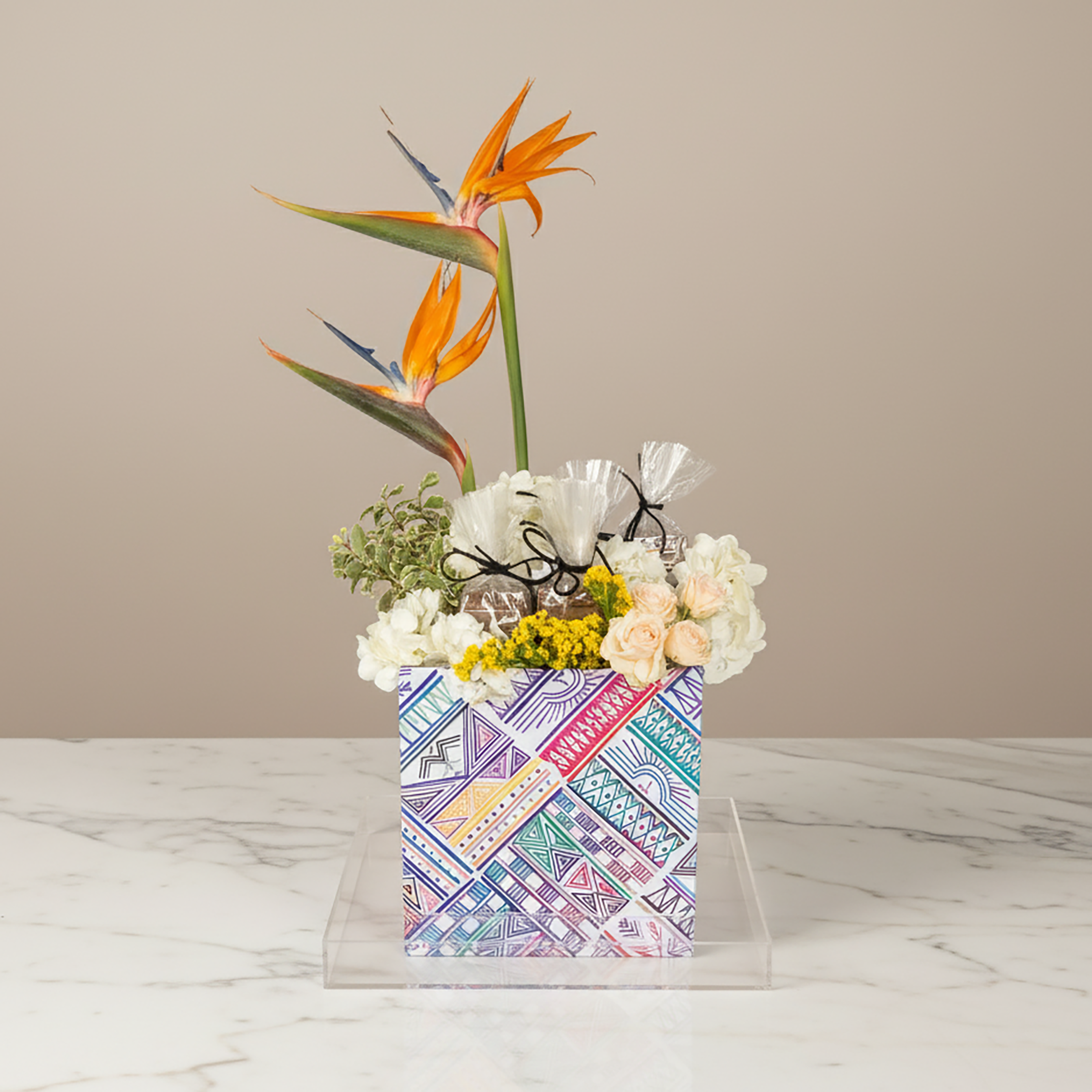 Flower arrangement with chocolate