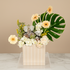 Flower arrangement with chocolate