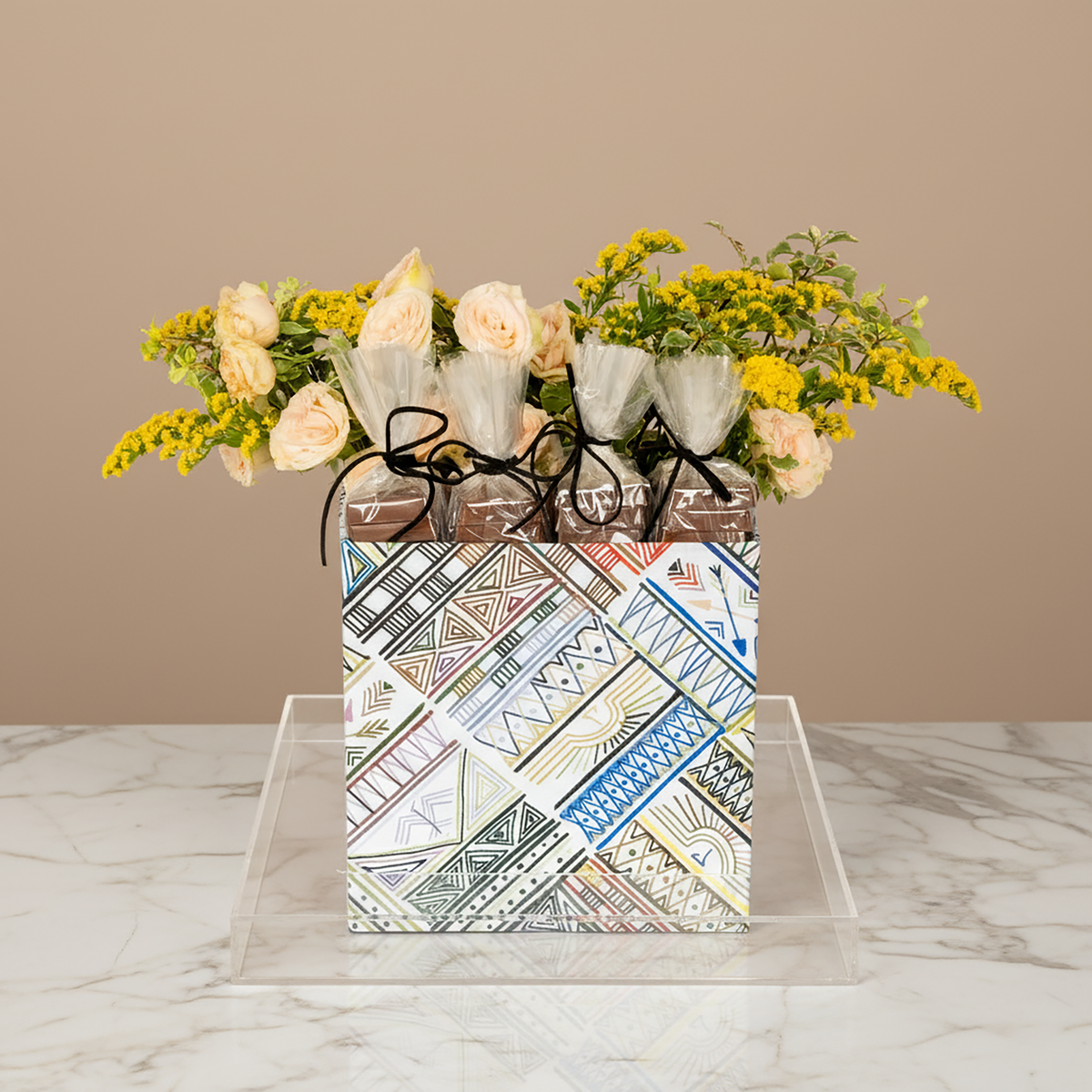 Flower arrangement with chocolate