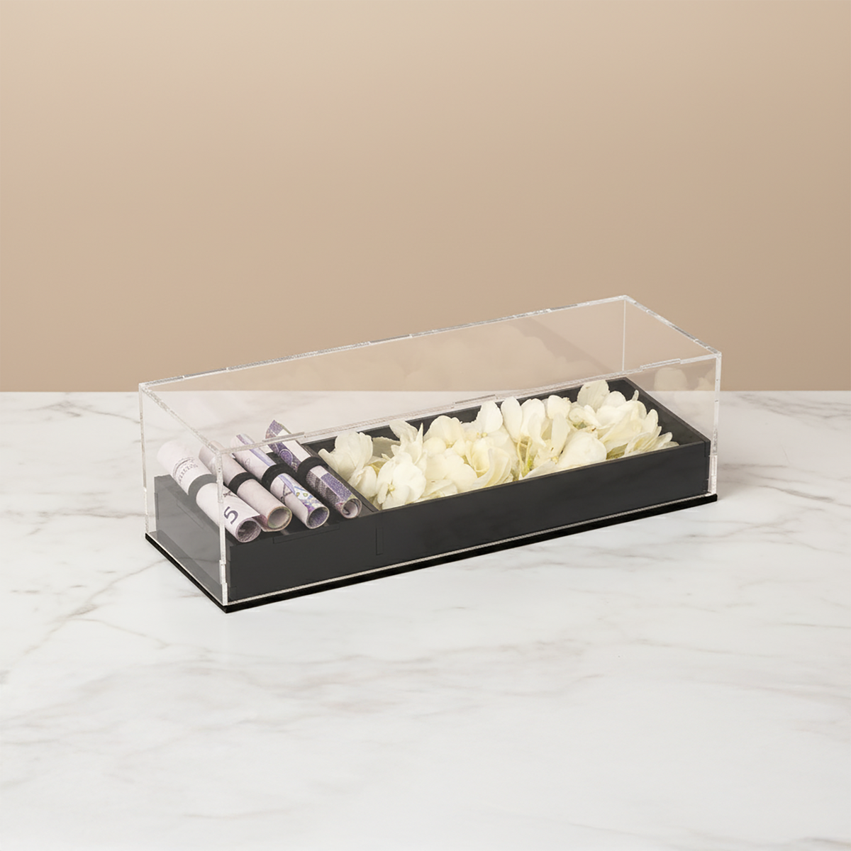 Flowers and cash gift in an acrylic box
